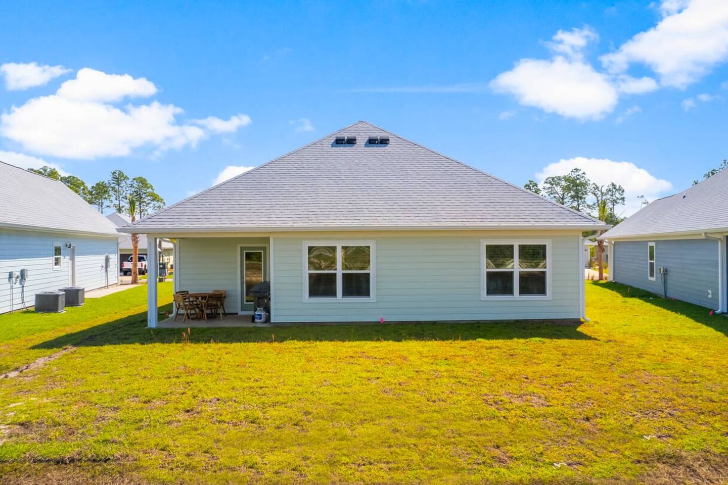 Well-designed home exterior with a comfortable backyard setting