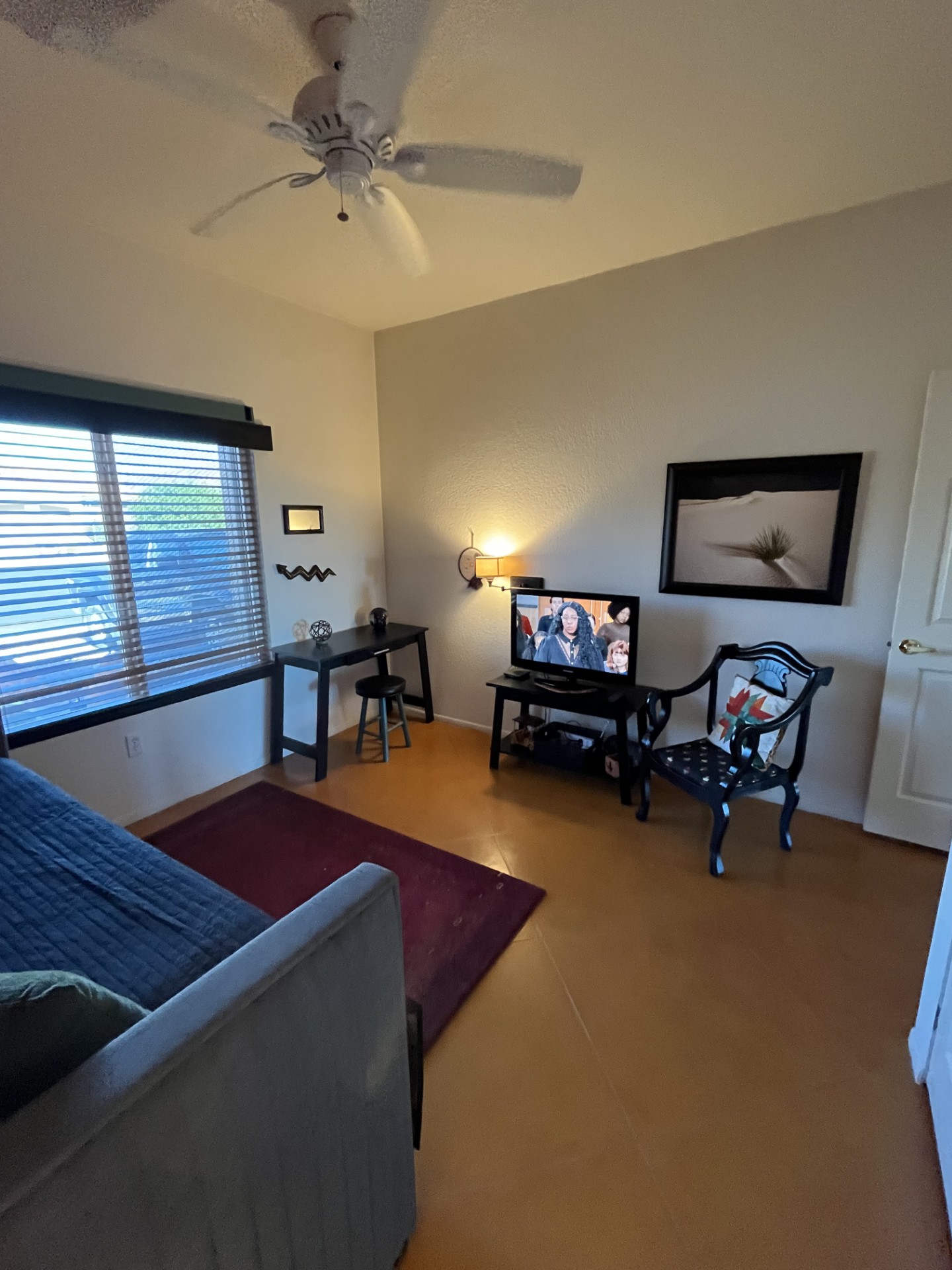 Desk and chair in the guest bedroom offers a work space