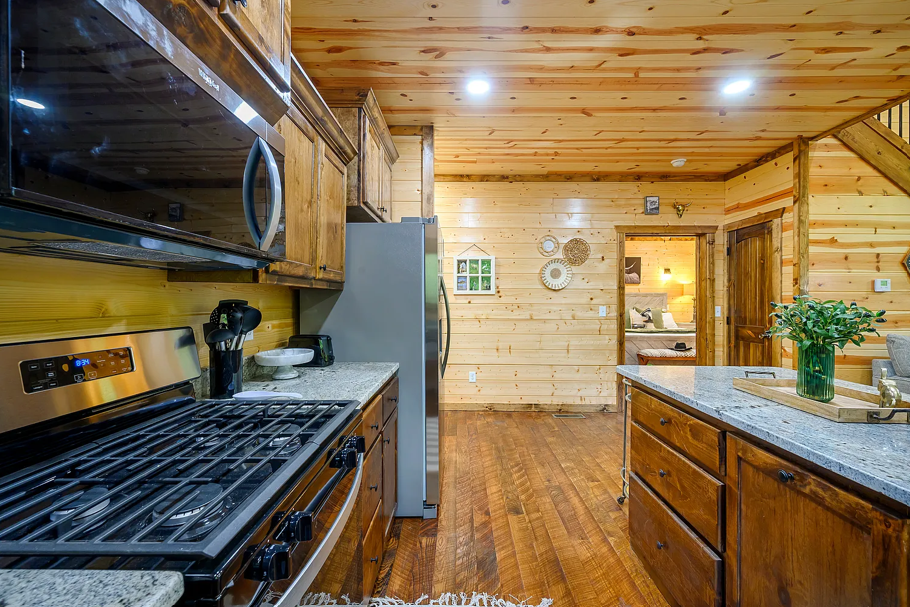 Fully equipped kitchen with modern appliances and open cabin layout