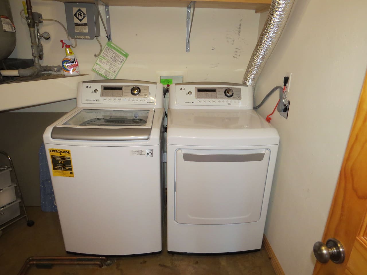 Utility room with washer and dryer.
