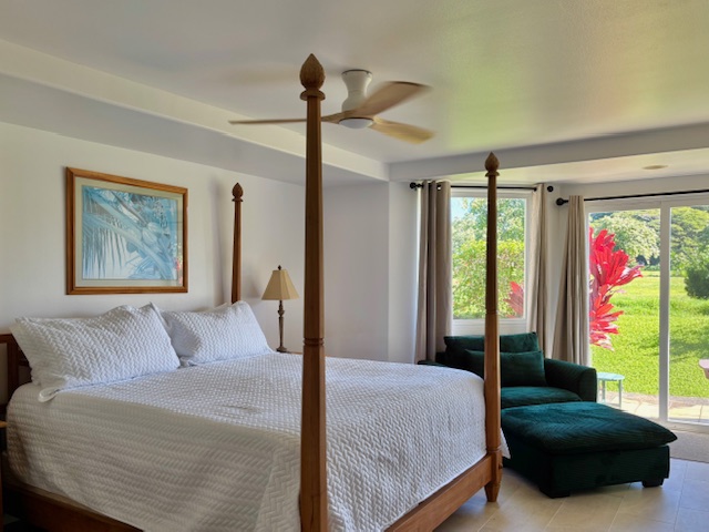 Master Bedroom with King Bed, Ceiling Fan, Lounge Chair