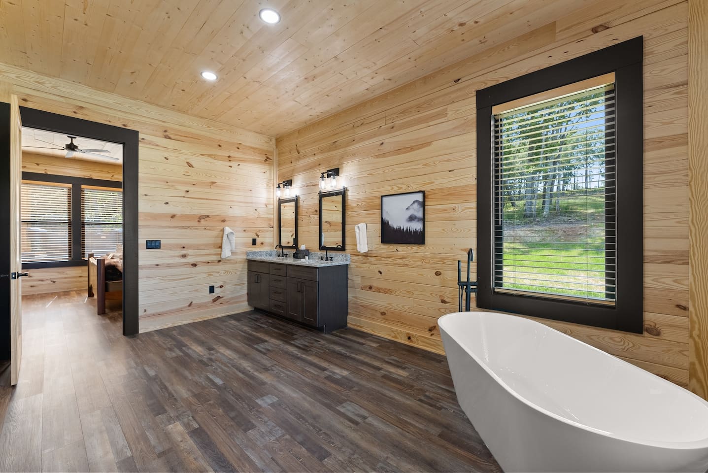 Take in peaceful forest views as you soak in the deep freestanding tub—pure mountain tranquility.