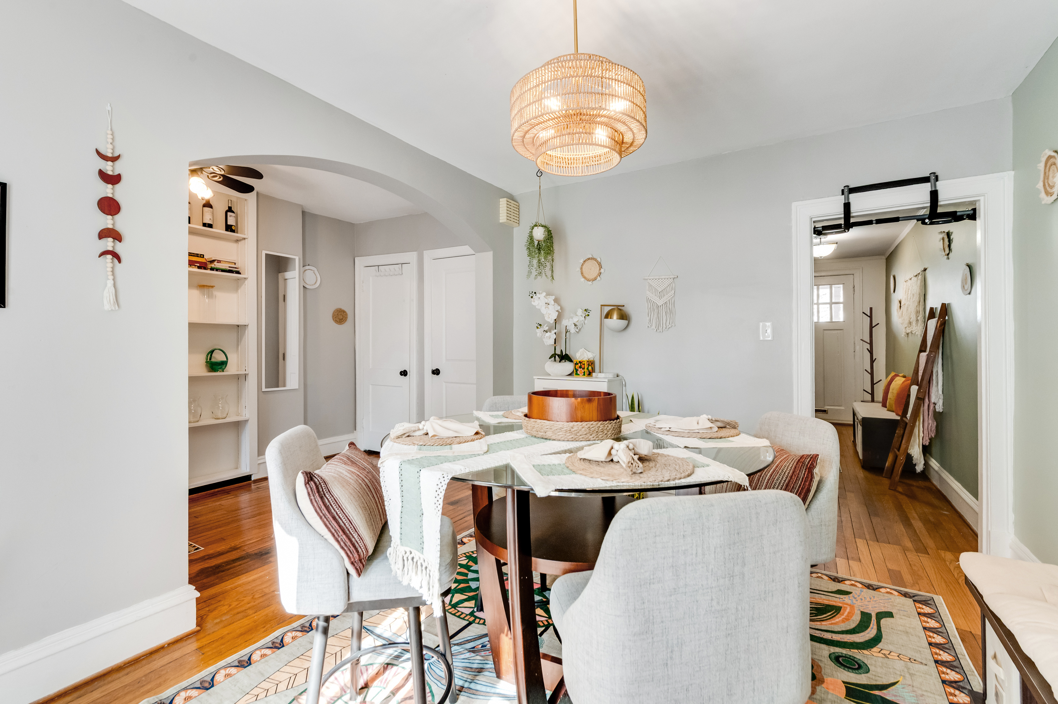 Dining Room: Enjoy meals under a stylish pendant light, surrounded by vibrant decor and warmth!