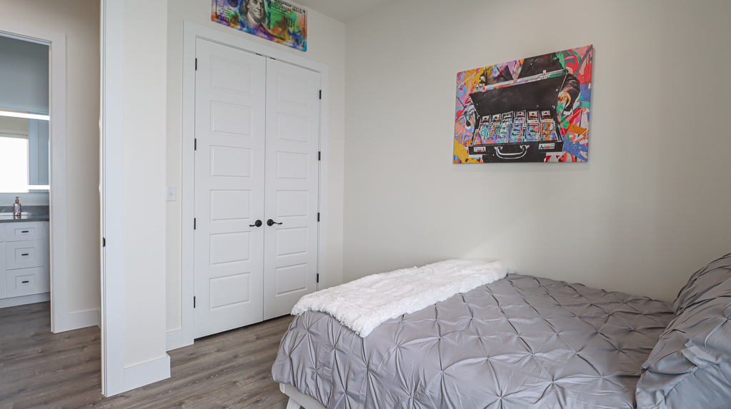 Queen Bedroom with Flat screen TV at Your Beach House