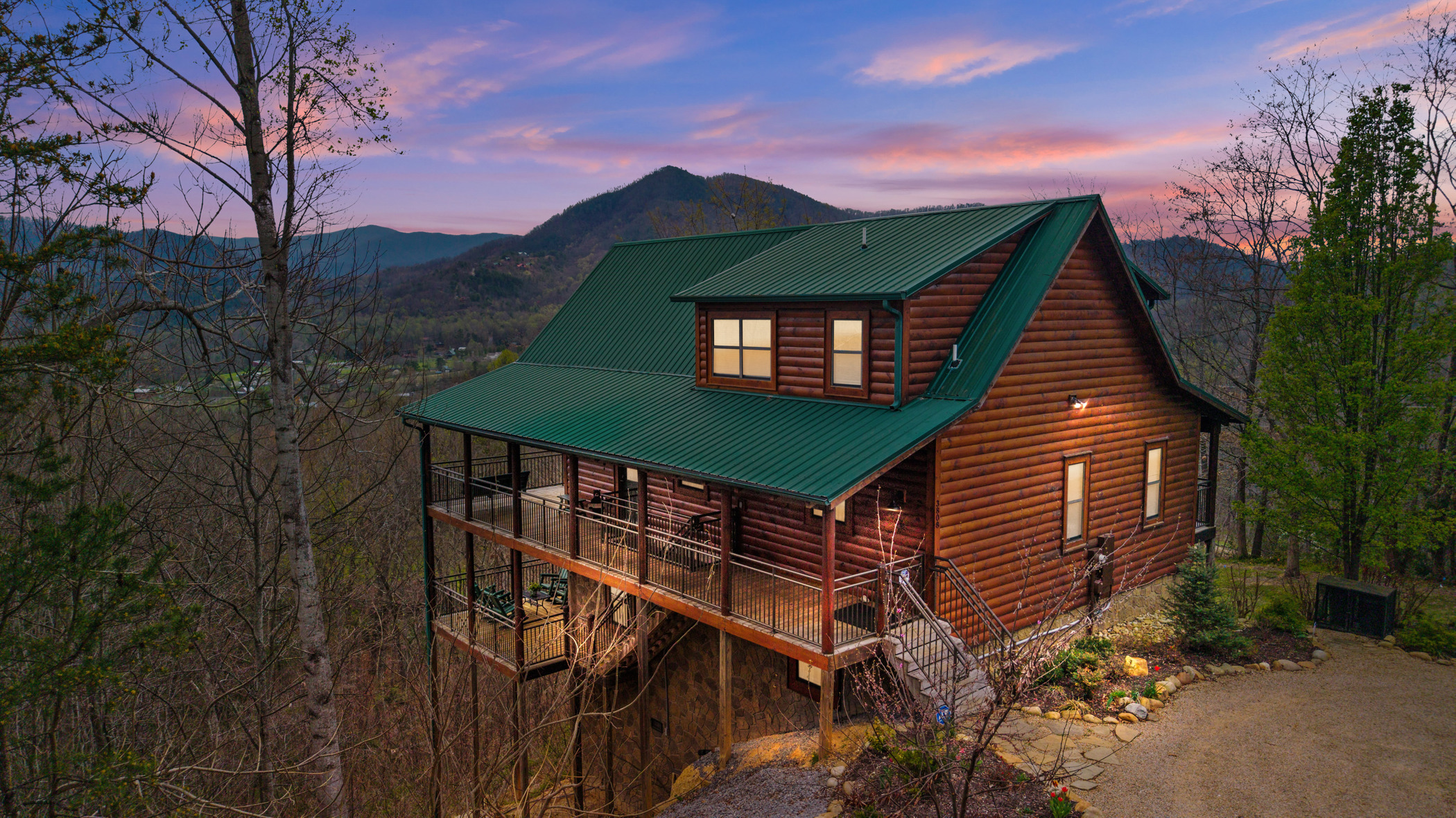 Evenings here feel different—sunset over the Smokies from your private cabin.