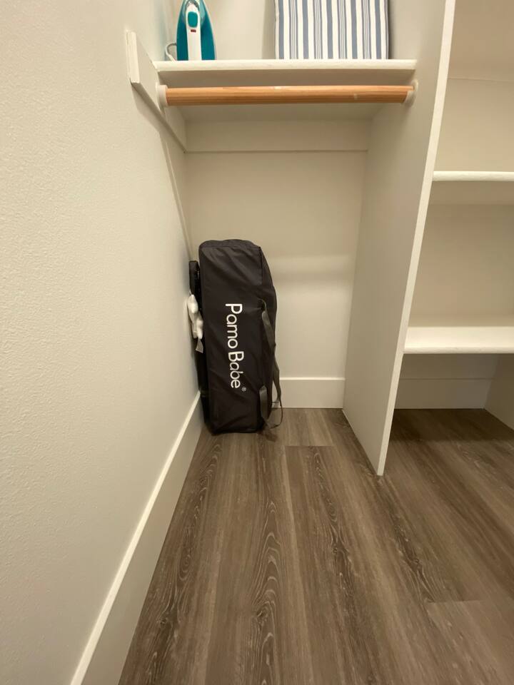 Portable crib in master closet