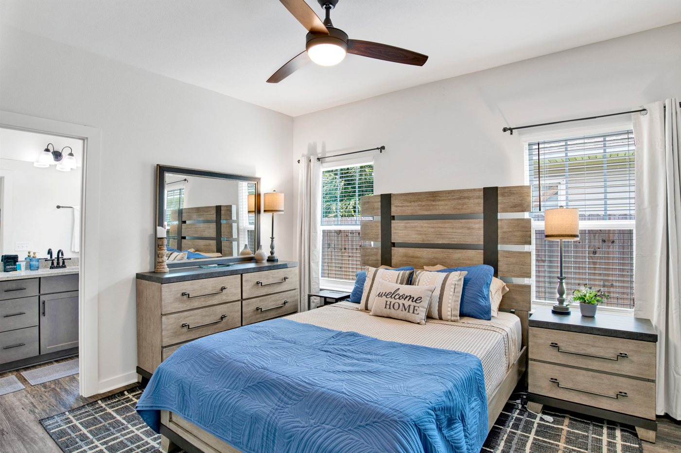 The master bedroom is pure calm after a beach day!
