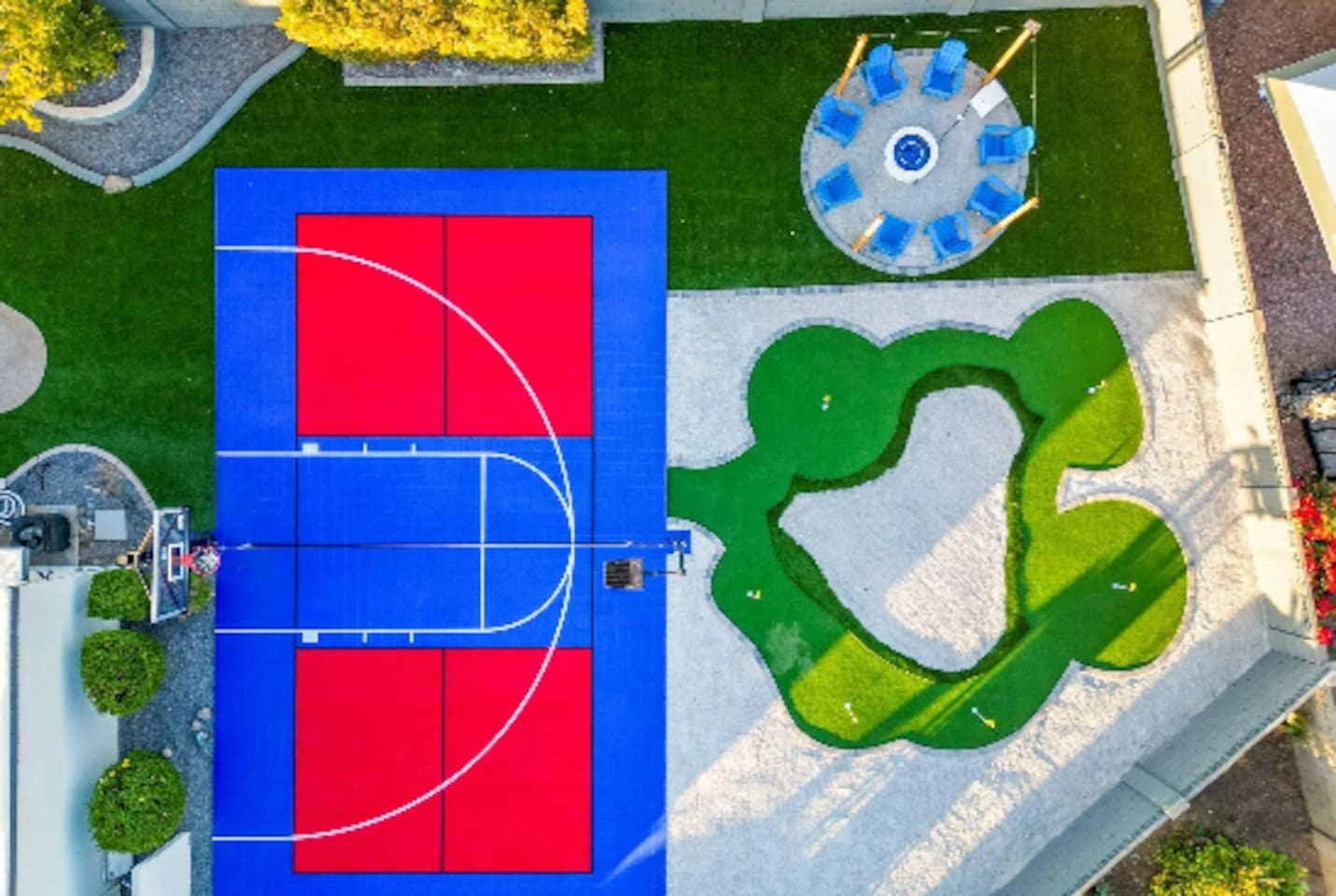 Sport court, putting green, and a shaded dining gazebo — all within a few steps of each other, all yours for the stay.