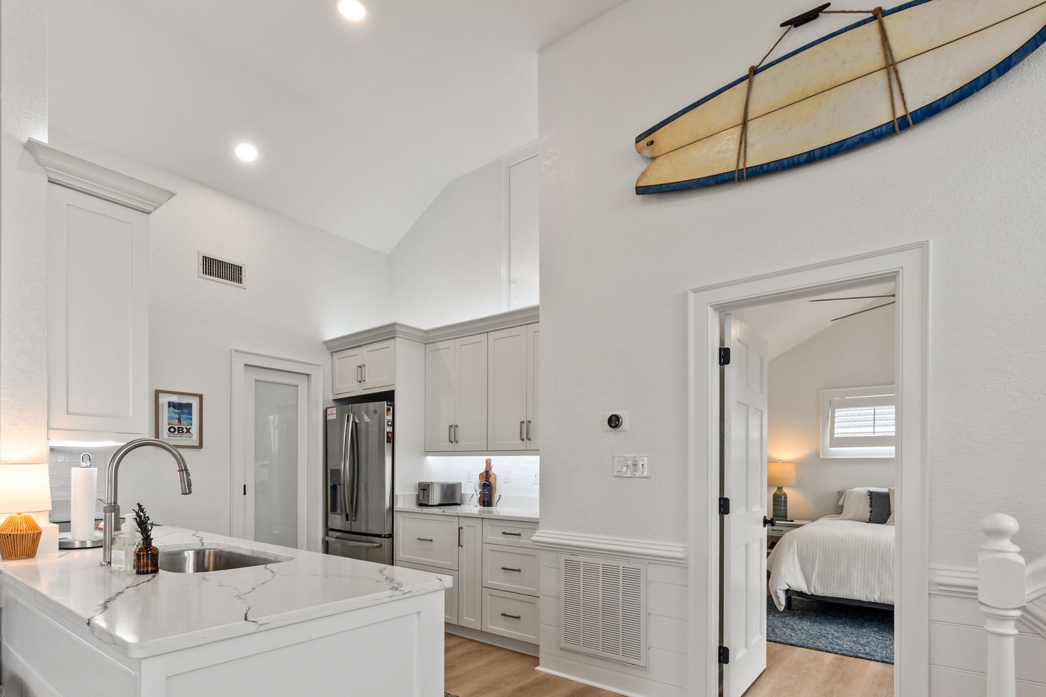 Clean, bright kitchen with modern finishes and everything within reach.