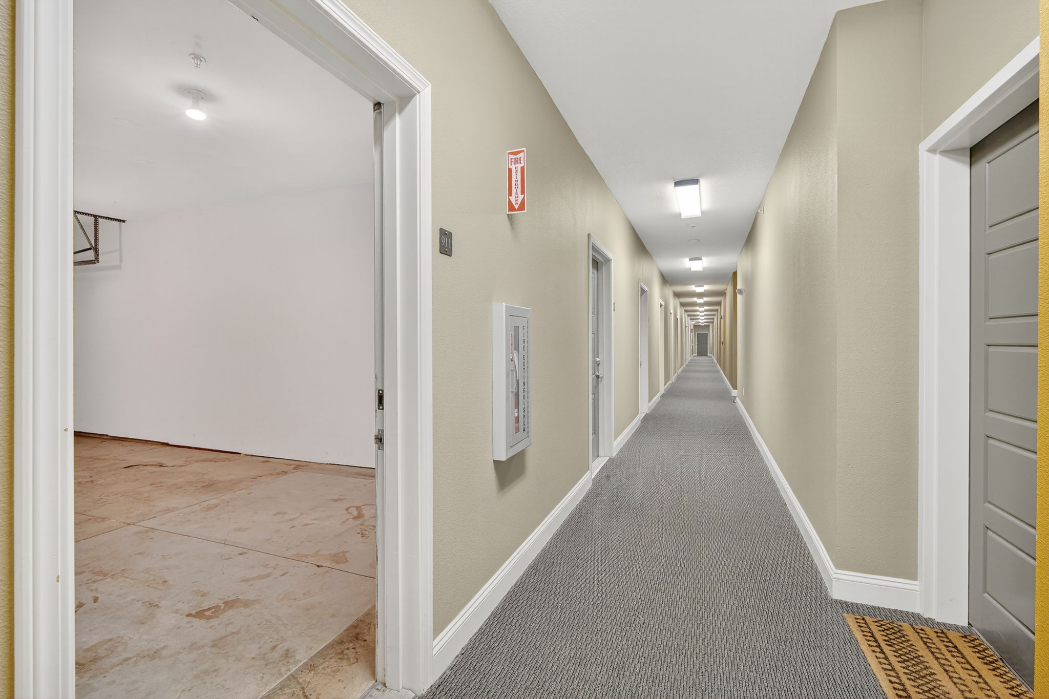 Step inside from the garage to the interior hallway, with your unit door located directly across the way. The ultimate convenience—weather-free, secure, and just steps from car to home.