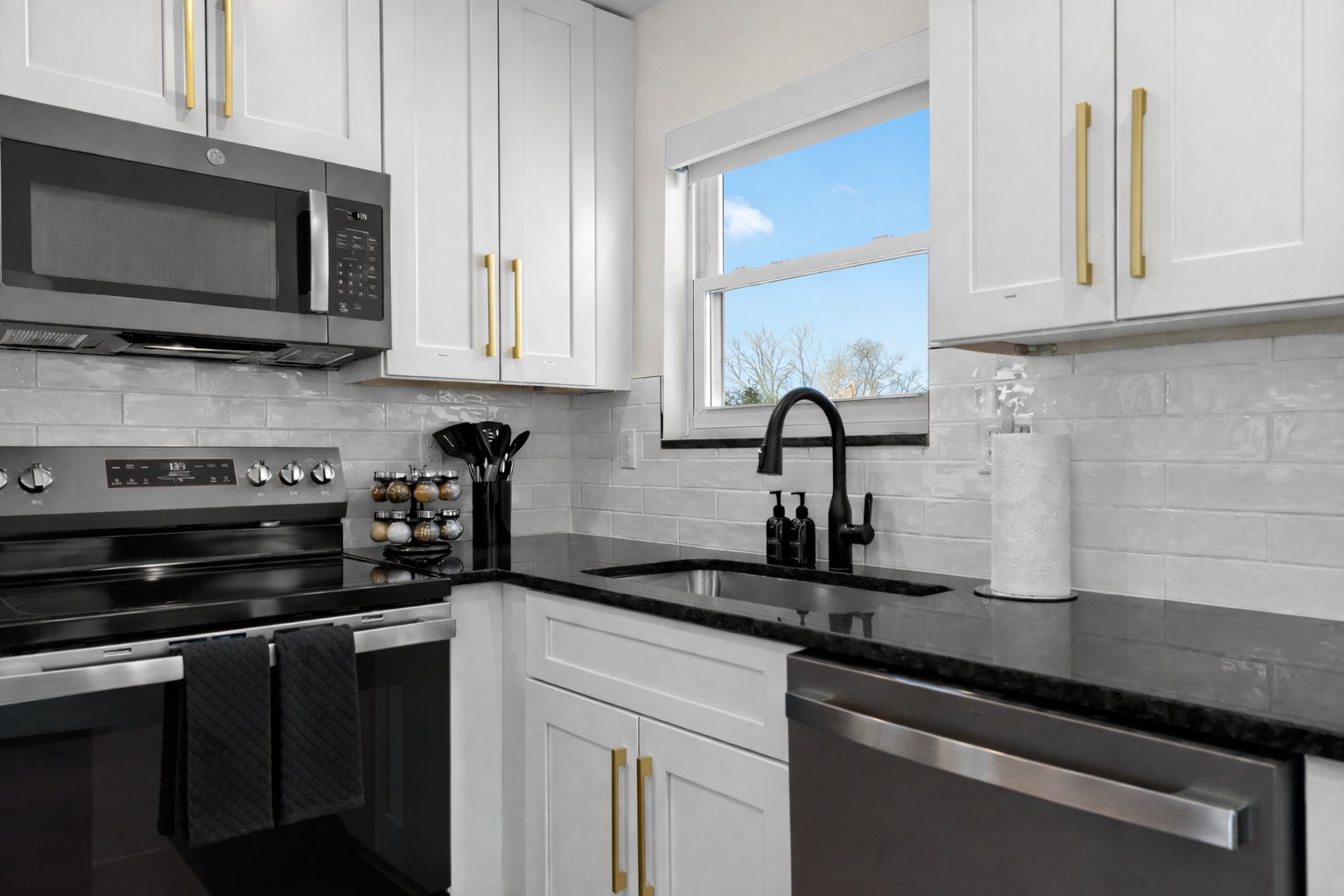 Modern kitchen details with sleek countertops, updated appliances, and bright natural light—clean, functional, and designed for easy, enjoyable cooking.