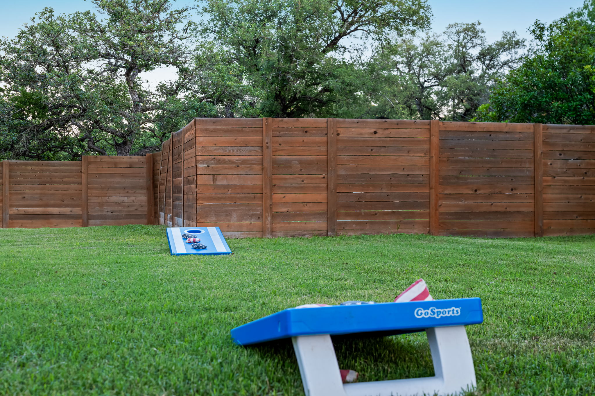 Challenge friends and family to a game of cornhole in the spacious fenced backyard. With plenty of open lawn space, it’s perfect for outdoor games, group fun, and relaxing afternoons outside.