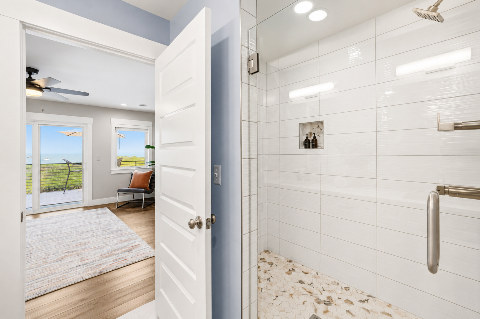 The oversized double walk-in shower and private toilet room complete this luxurious en-suite, creating a relaxing retreat after a day spent enjoying Lake St. Clair.
