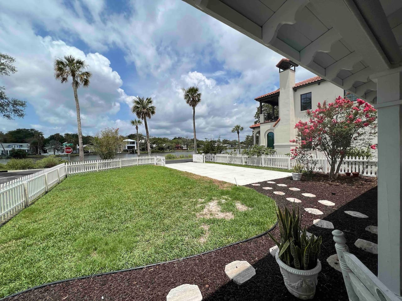 New driveway, and still plenty of yard to play! Gate allows you to enclose the driveway for young guest safety. 