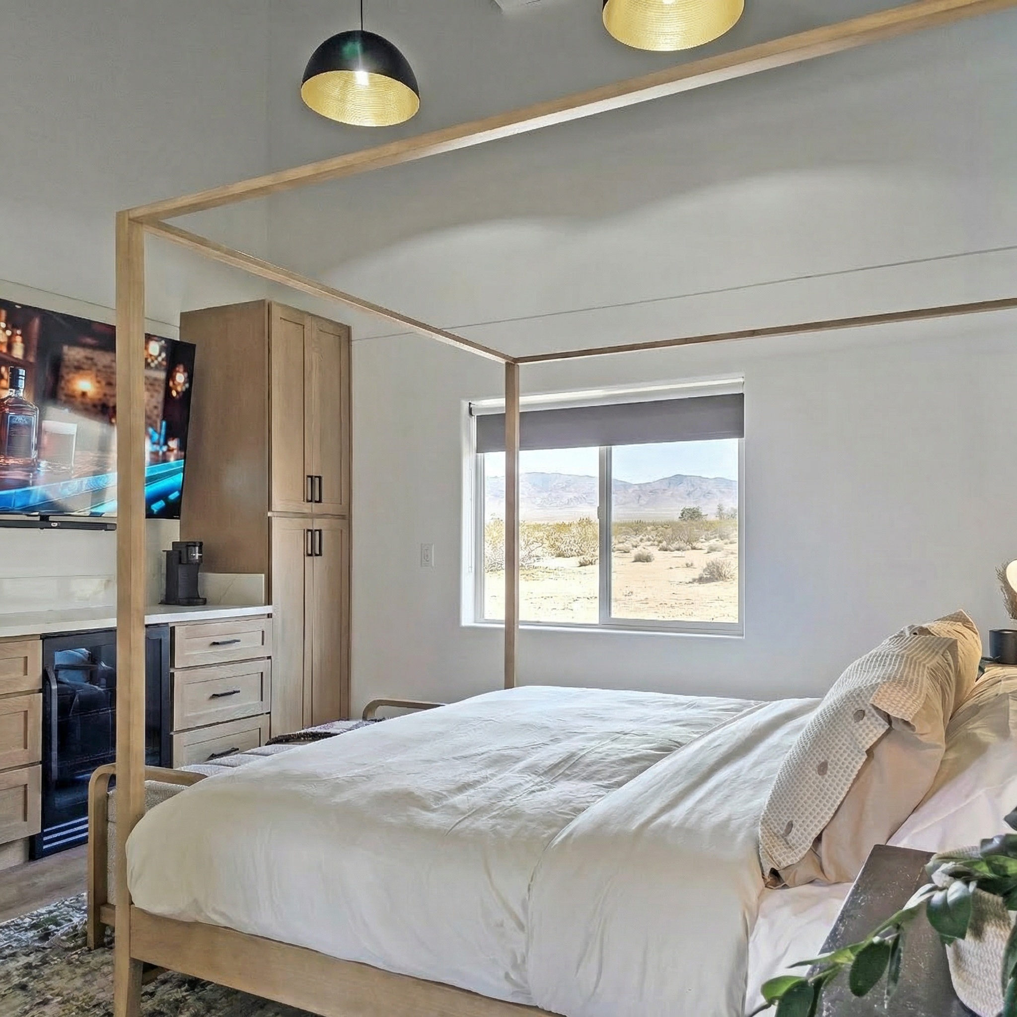 Private entrance from patio with king bed and beverage fridge, coffee maker and 75" smart tv with surround sound.