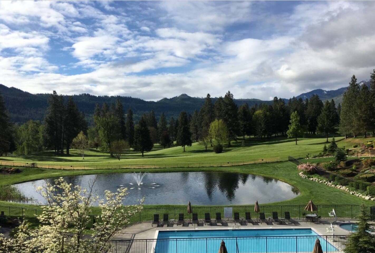 This is the view from our back balcony, the pool, hot tub, pond, and the 14th green of the golf course. The nicest view from all of the condo's in this complex. 