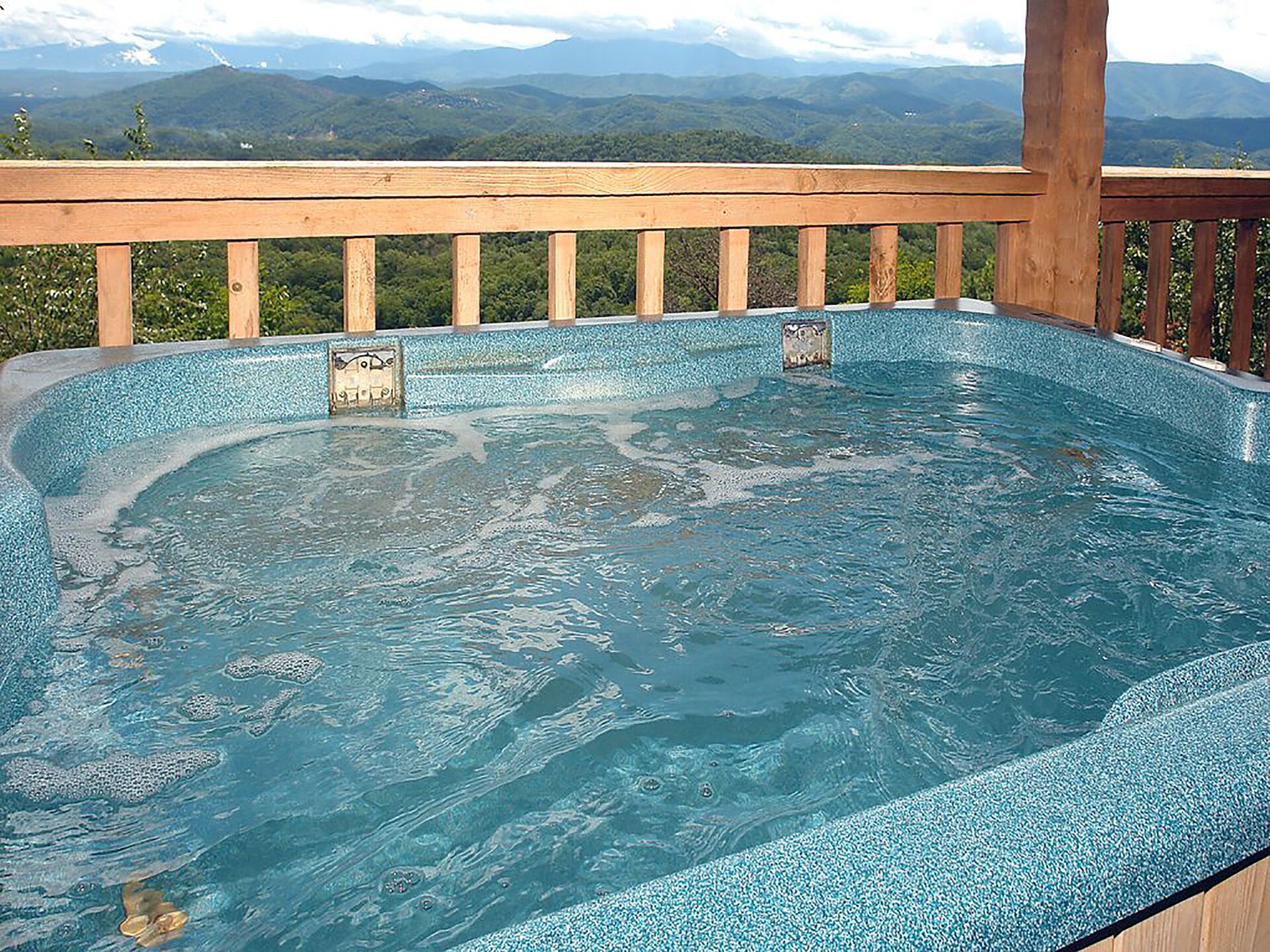 Hot tub with amazing views to enjoy after a day of playing in the mountains