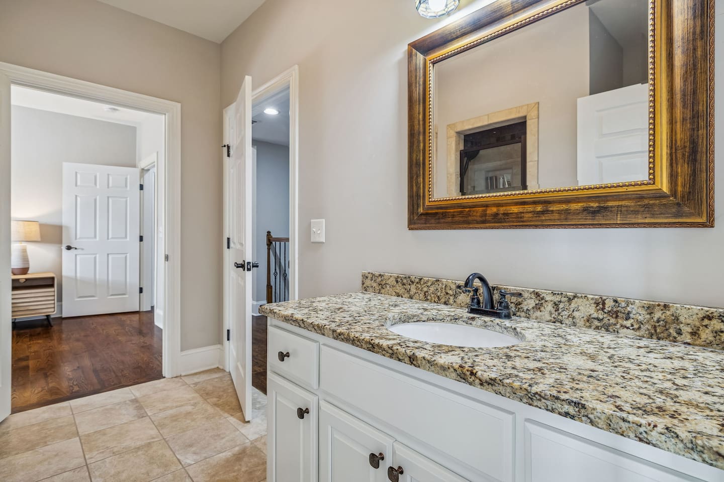 Upstairs bathroom with view of Green Bed bedroom