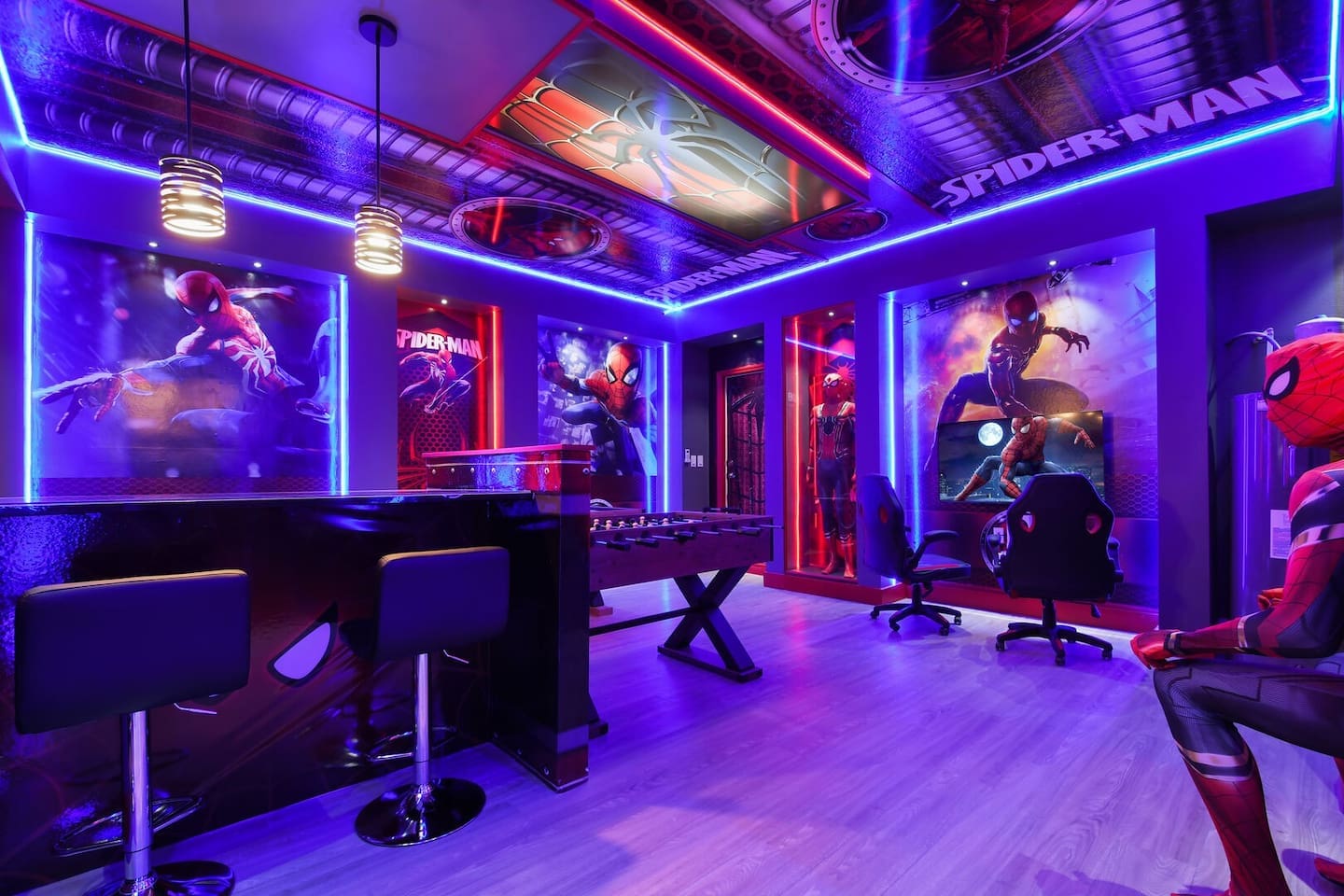 Step into an extraordinary Spider-Man-themed arcade room, where custom details and vibrant design bring superhero adventures to life