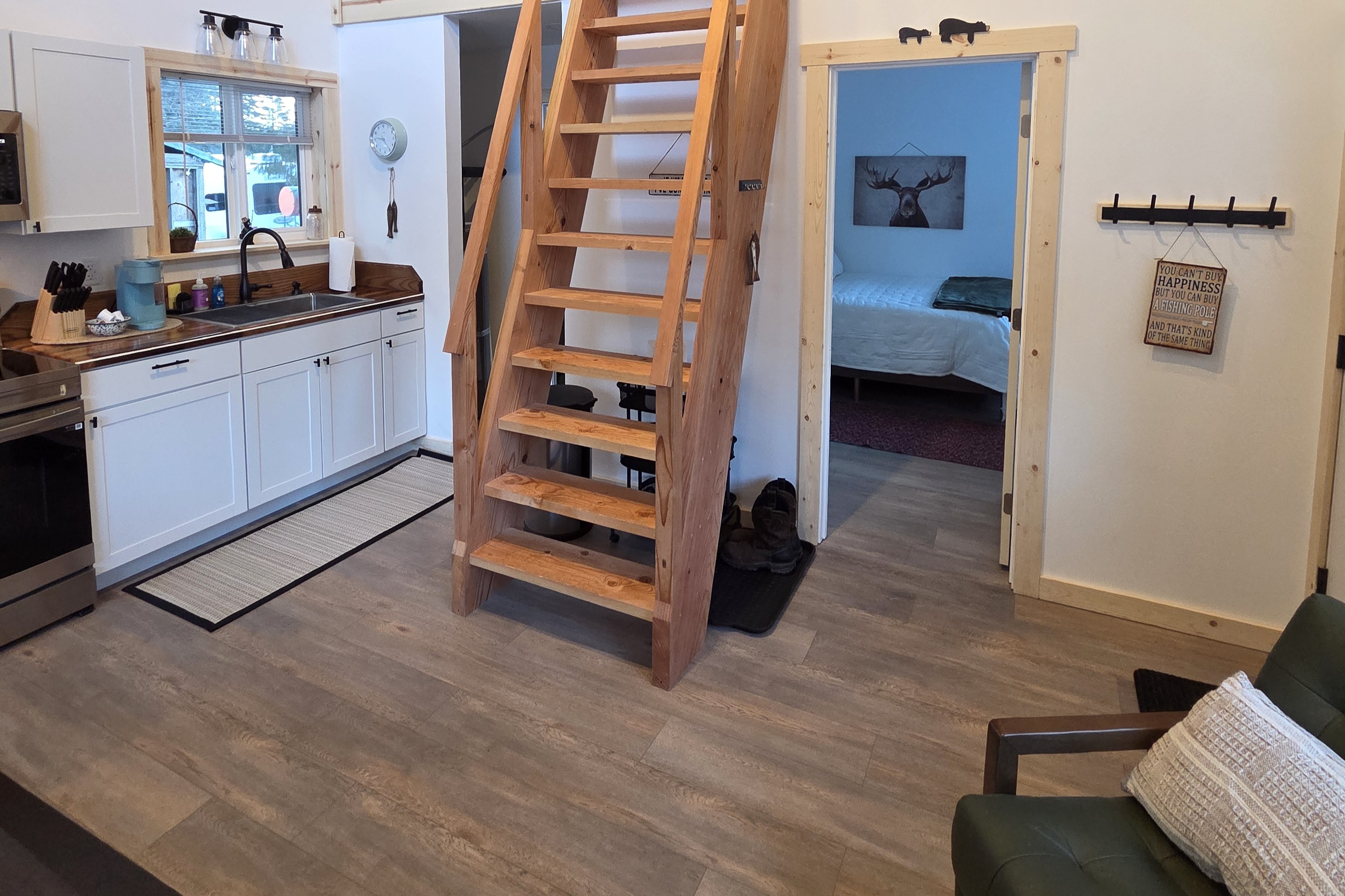 Main floor area.  Bedroom is to the right front.  Bathroom and laundry are to the right rear.  Ships Ladder access to the loft living area and additional sleeping area.
