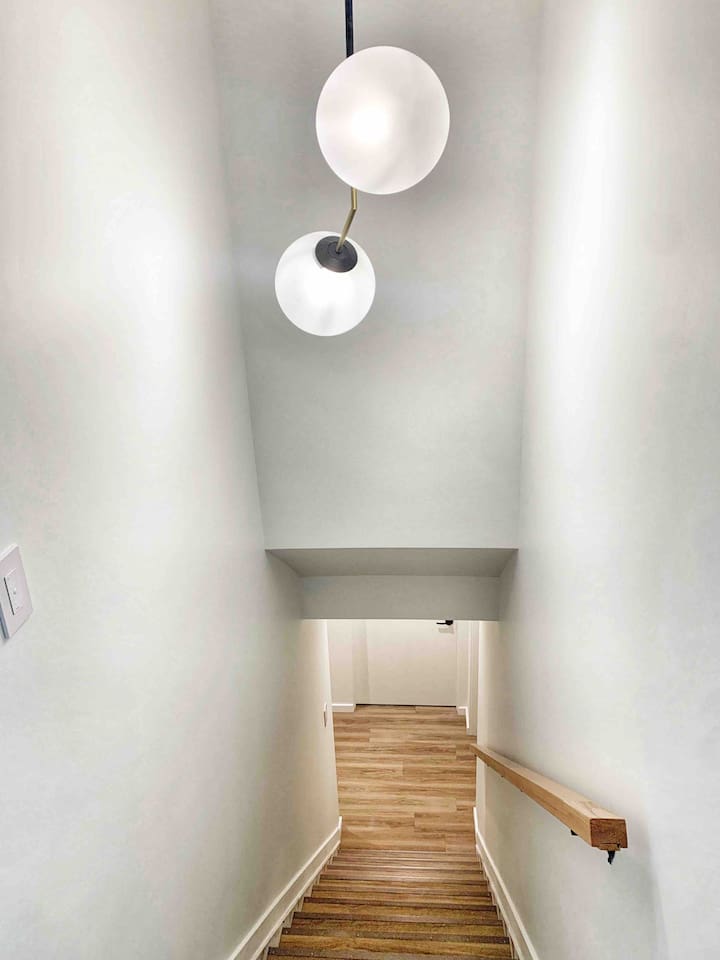 Lower-level hallway leading to your private suite.