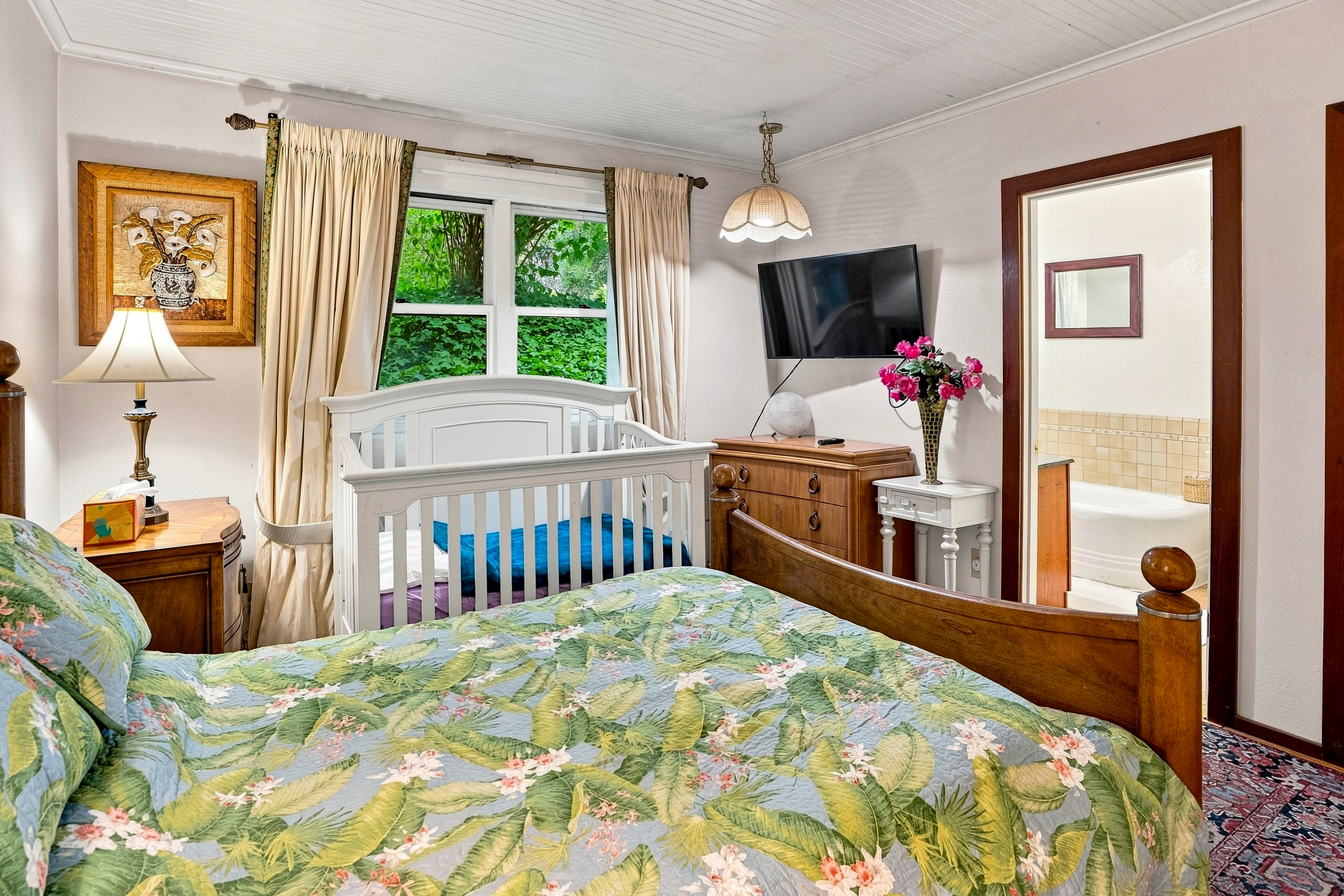 Bedroom 1 with Queen Bed and Crib