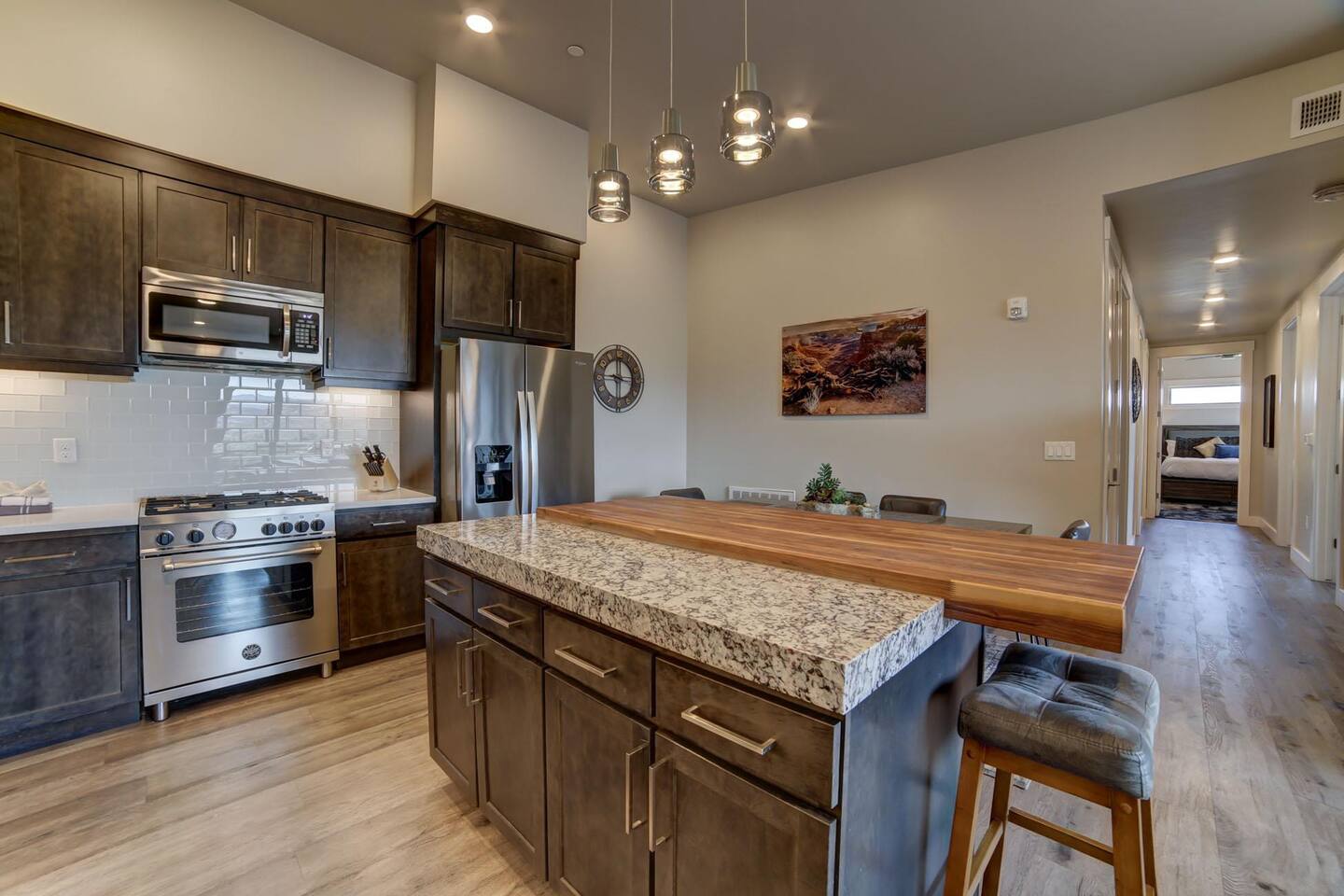 Modern luxurious kitchen with island bar and deluxe appliances