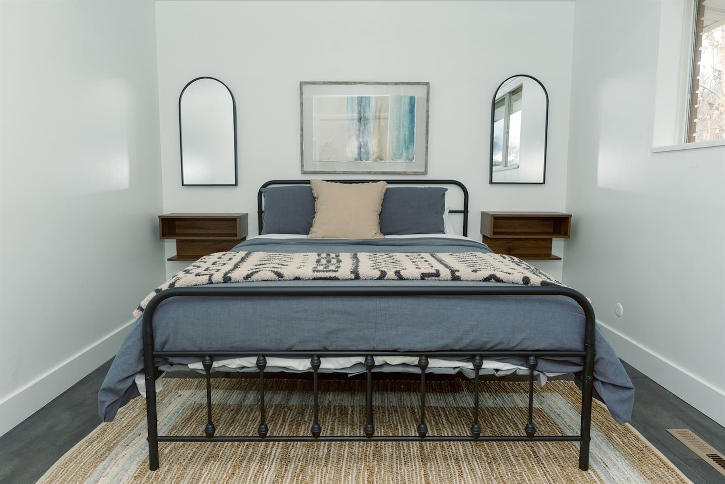 The main bedroom has a queen bed with connected bathroom.