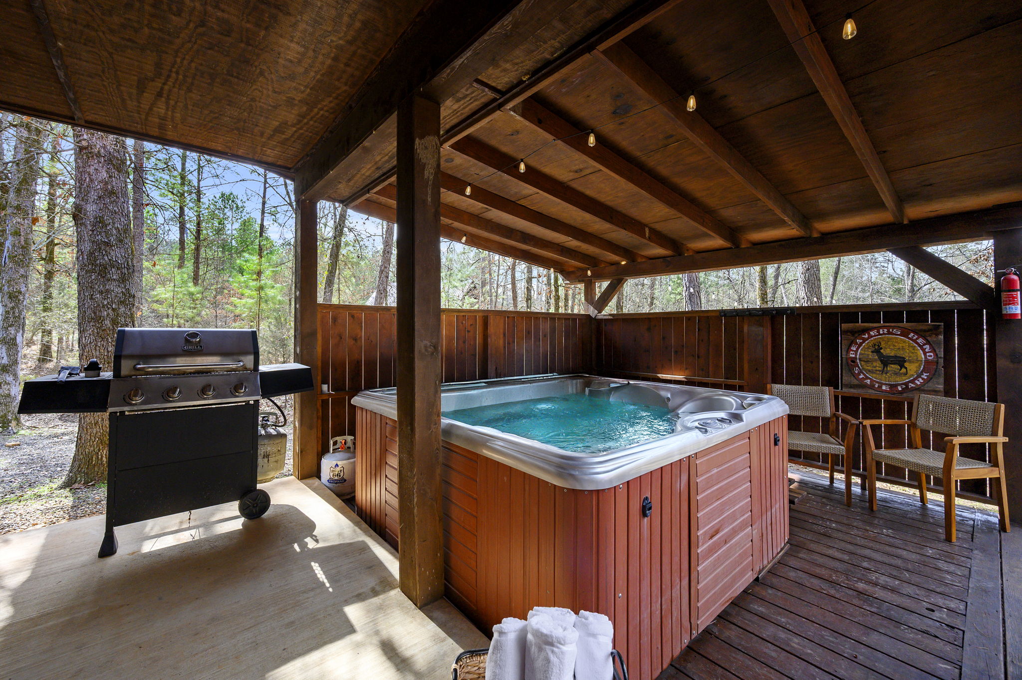 Private Hot Tub:
A secluded hot tub tucked into the trees for ultimate relaxation. Soak after a day on the lake or trails and enjoy a true spa-like experience in total privacy.