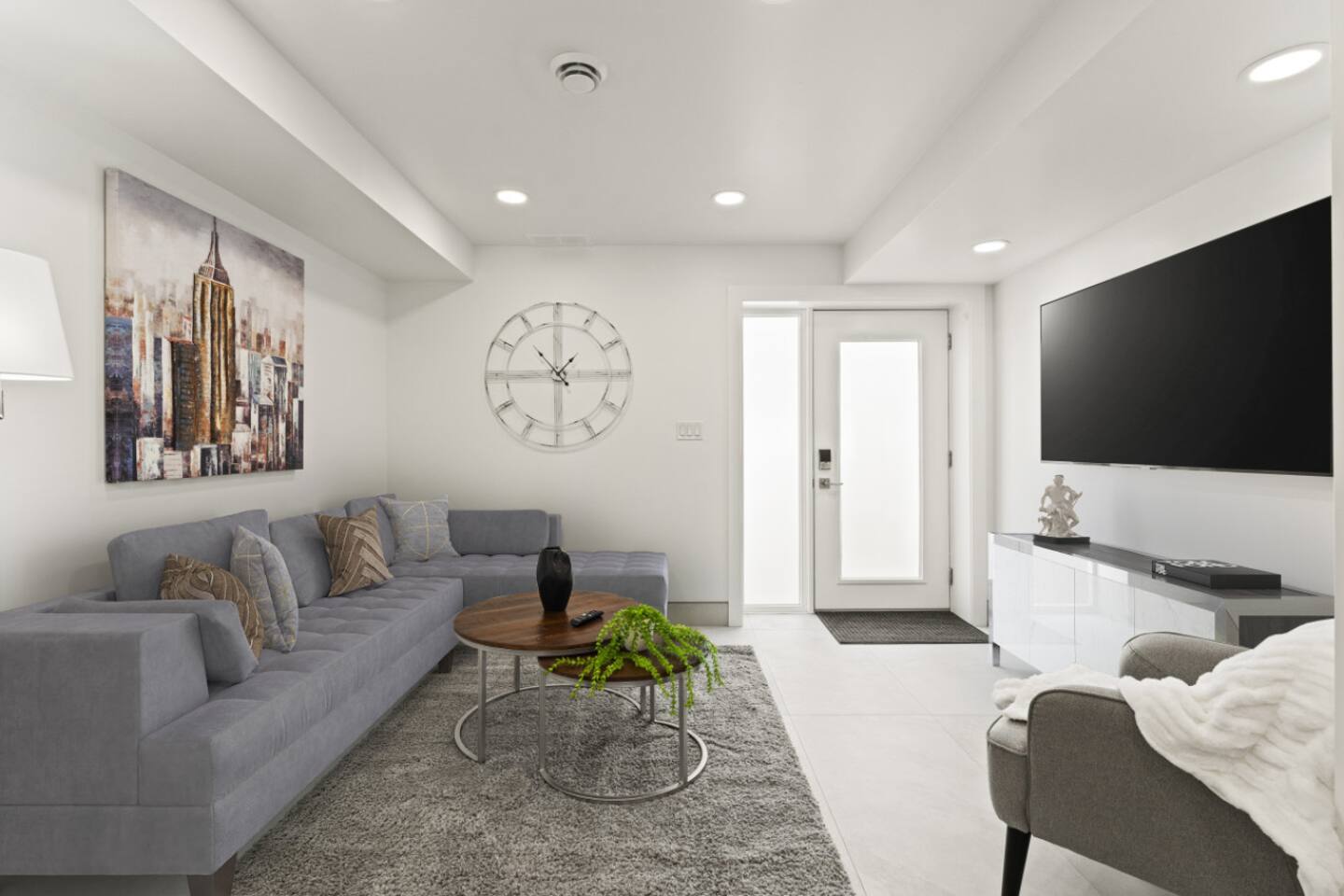 A comfortable living room design for entertainment and relaxation.