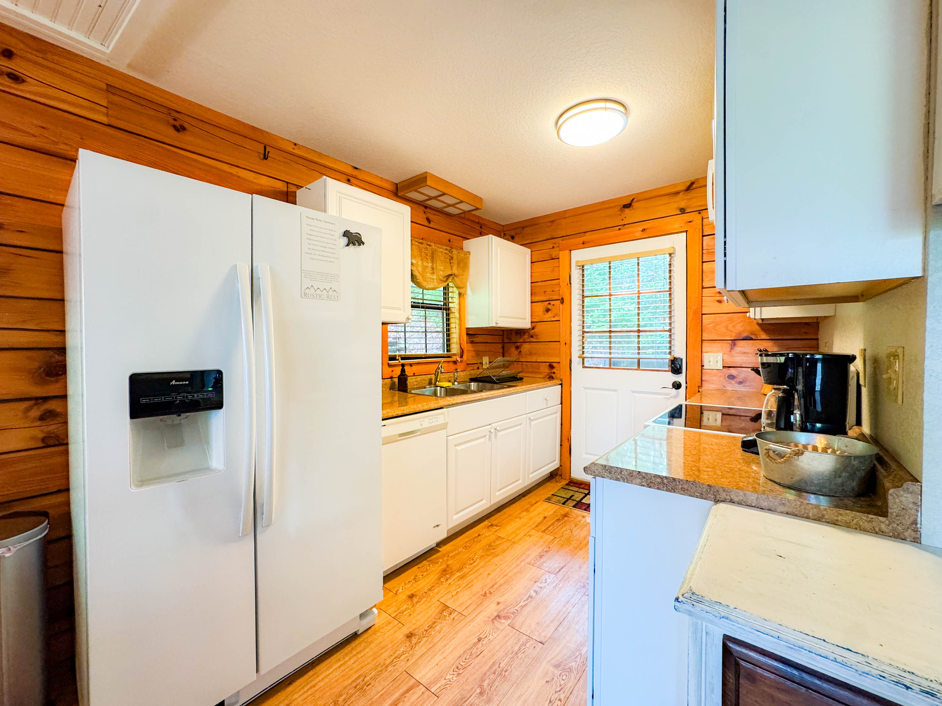 Small and efficient kitchen fully equipped with all basic cooking utensils
