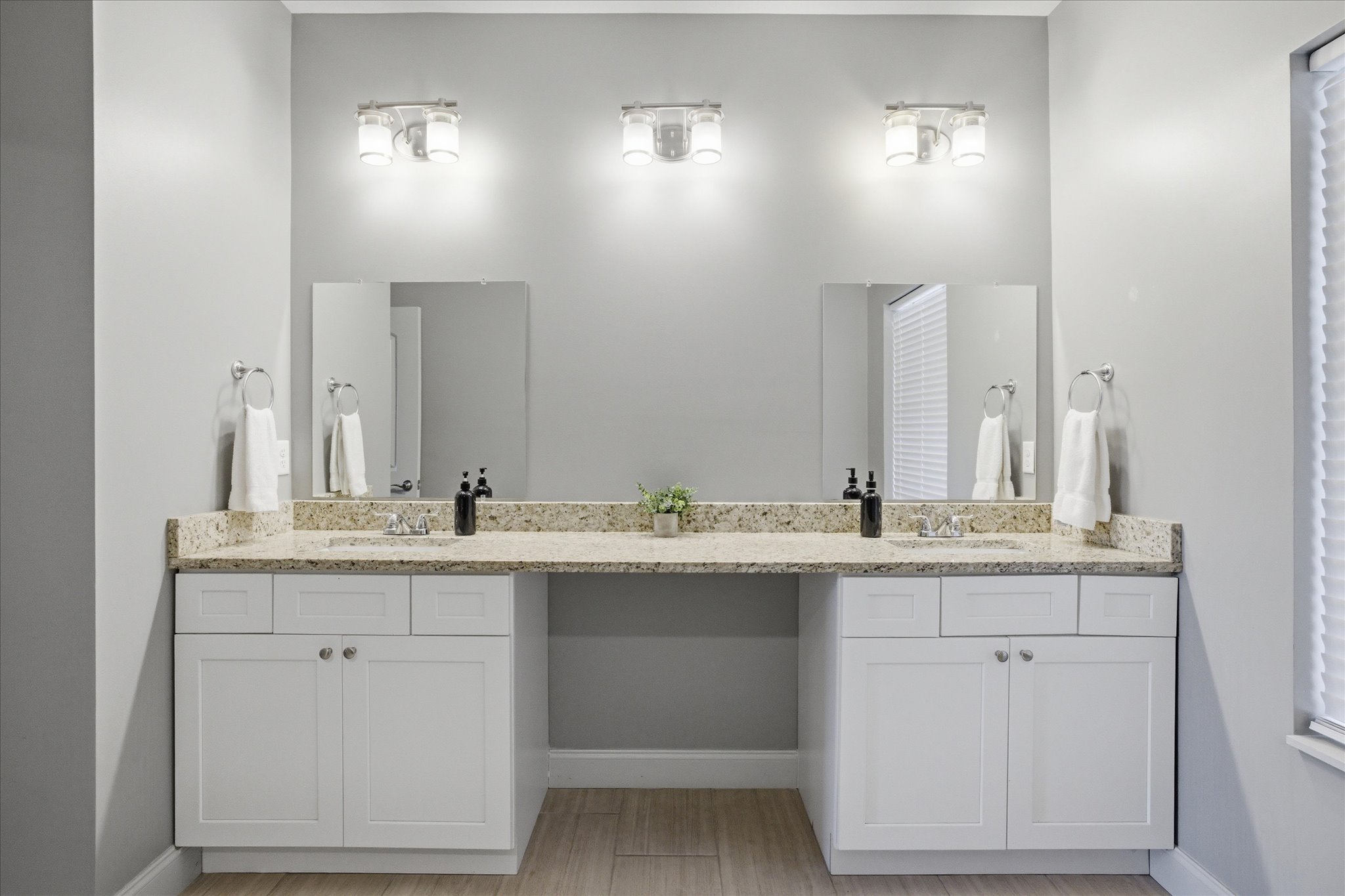 A clean, open setup in Unit 5 with double sinks and a full shower gives you space to get ready without waiting your turn.