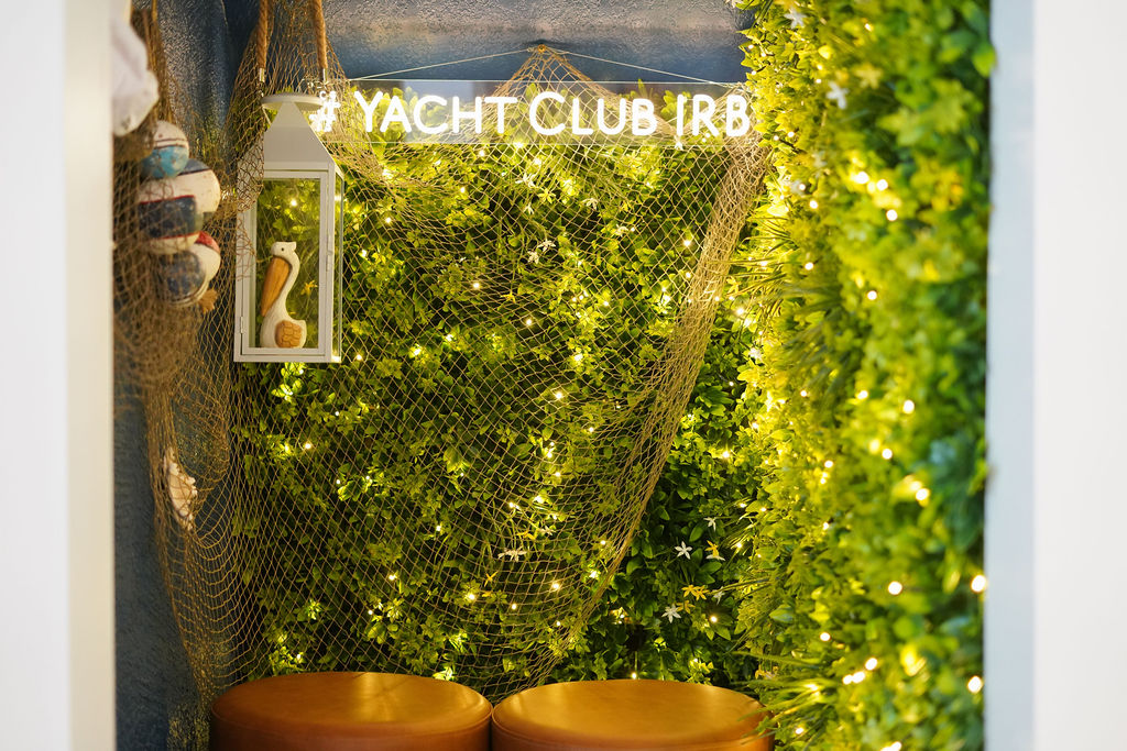 Take photos in the Yacht Club photo booth