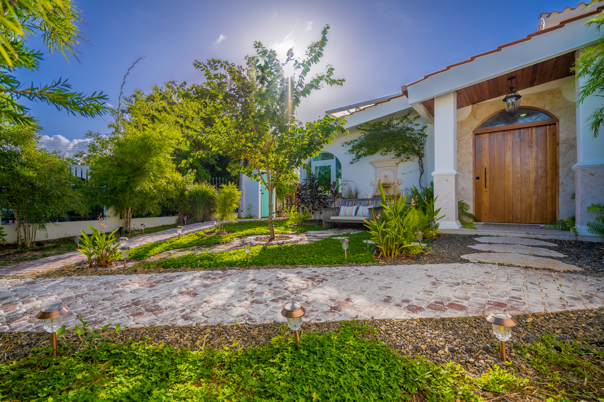 A view of our custom teak entry door in Dorado, Puerto Rico