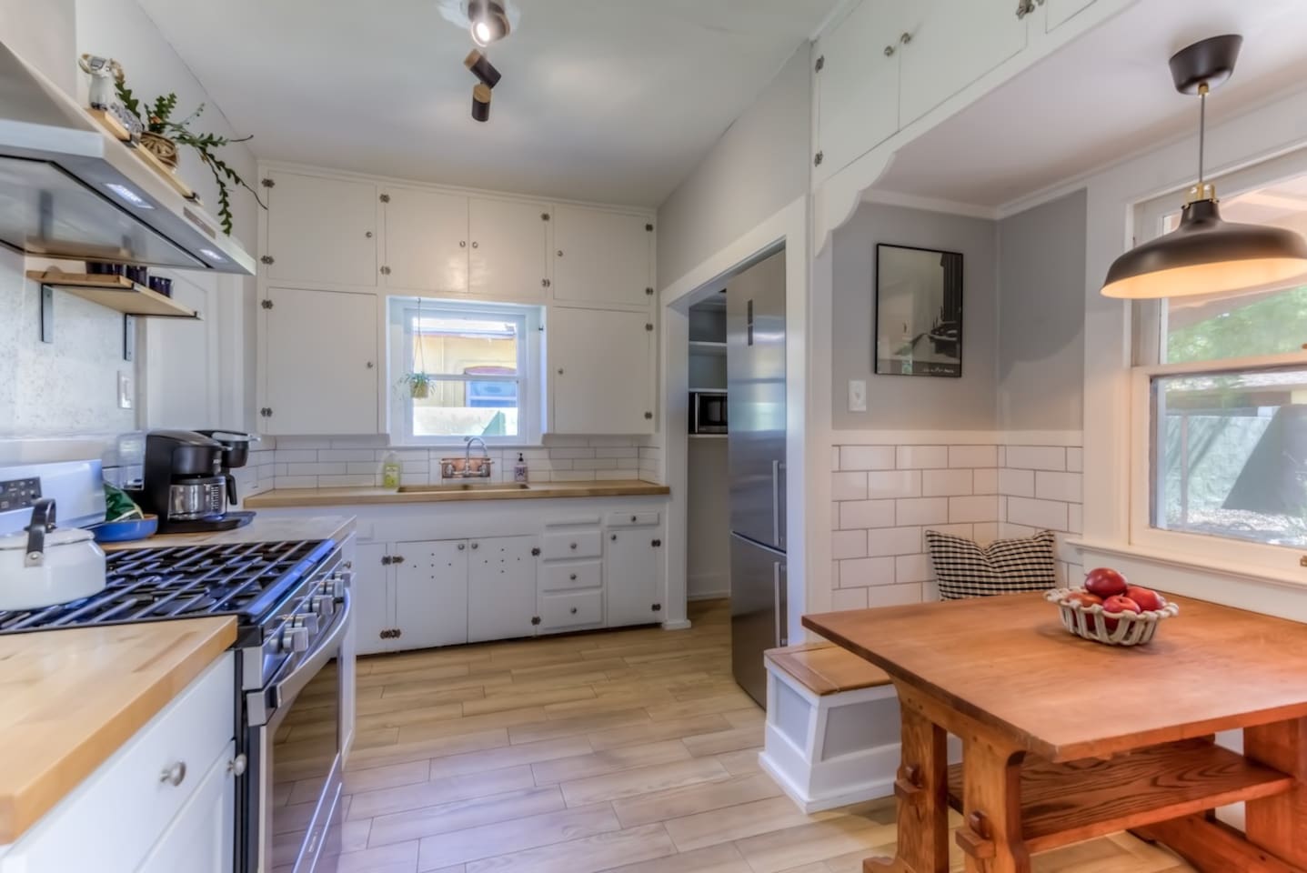 vintage kitchen with updated stove and fridge