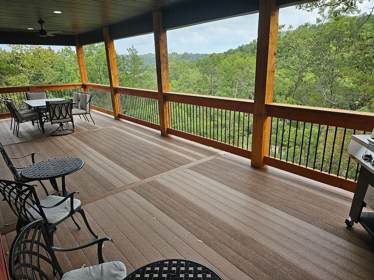Take in peaceful wooded views from the expansive covered deck.
