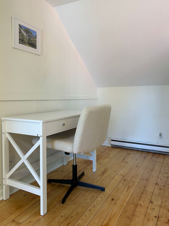 This workspace adjoins the primary bedroom on the second floor