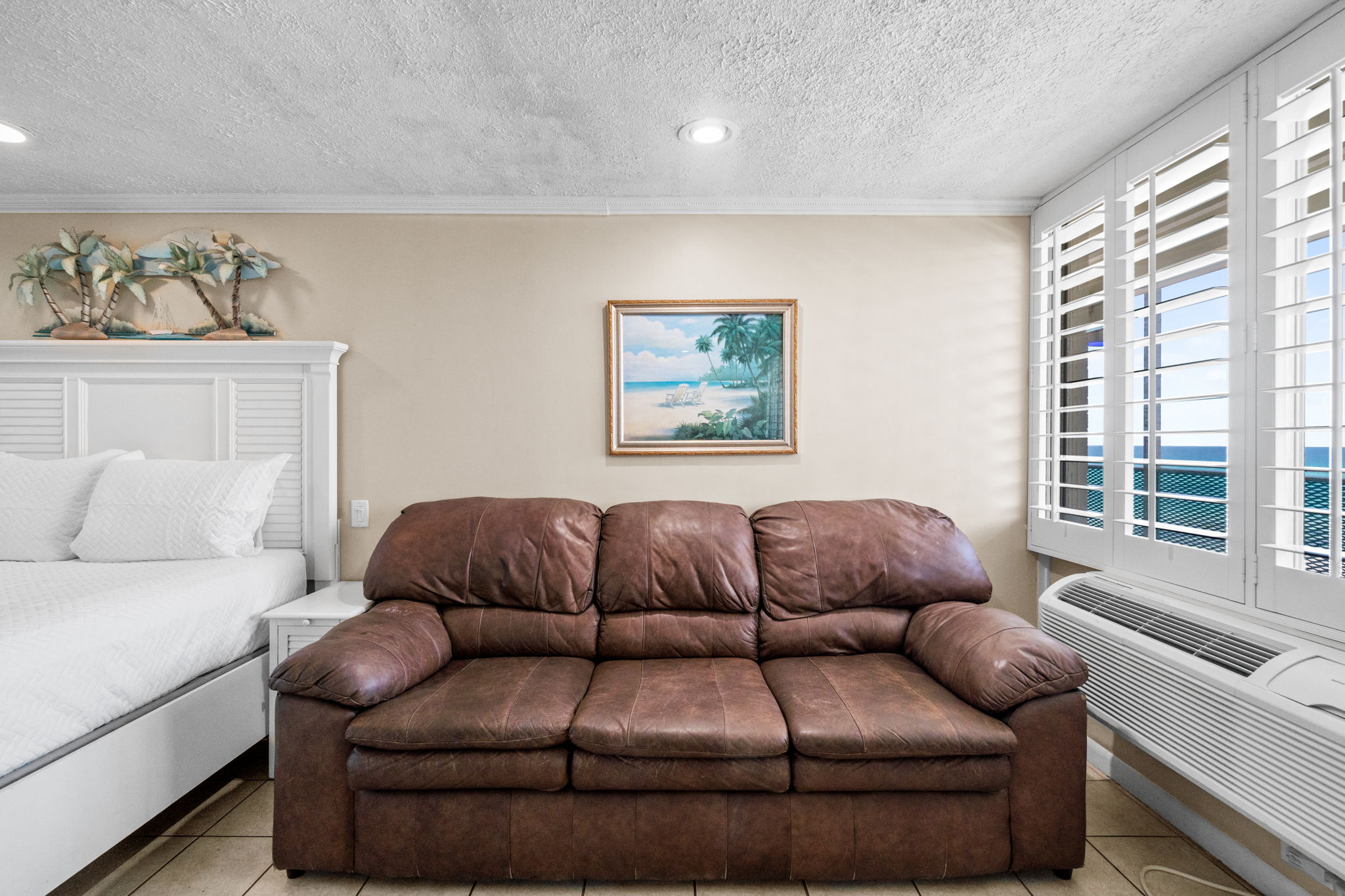 Living Area with Queen Bed and Sleeper Sofa