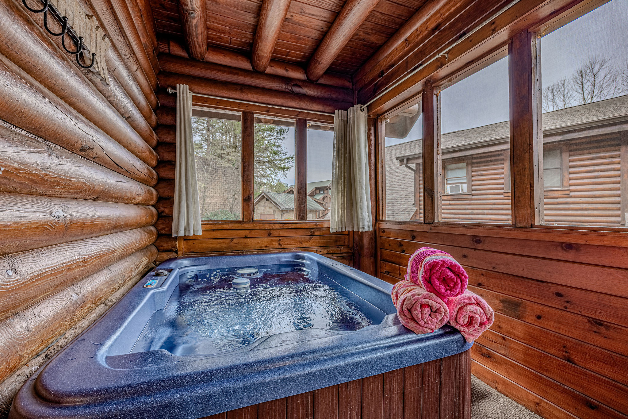 Hot tub nestled in the enclosed deck!