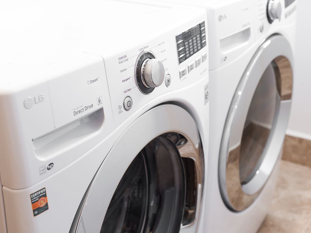 The villa features a dedicated, separate laundry room equipped with high-capacity washers and dryers.