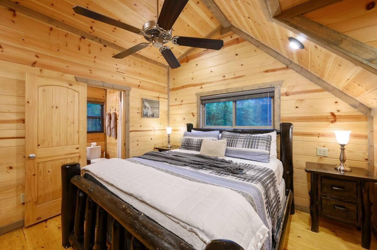 Upstairs King master bedroom with en-suite bathroom and 50" Roku TV.