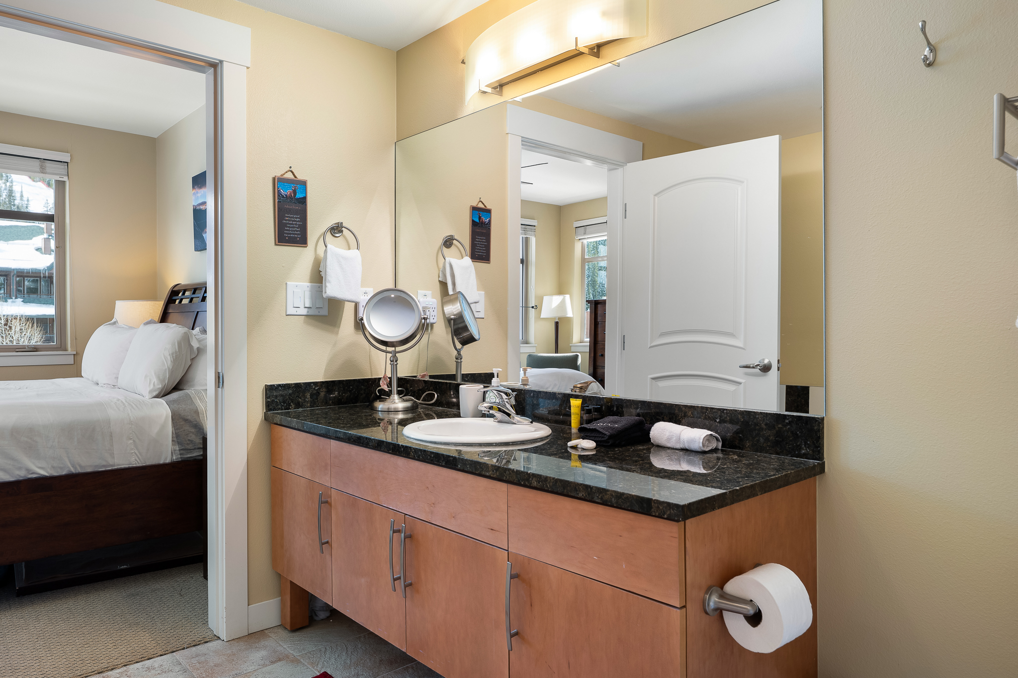 Large vanity with makeup mirror and dimmable lighting