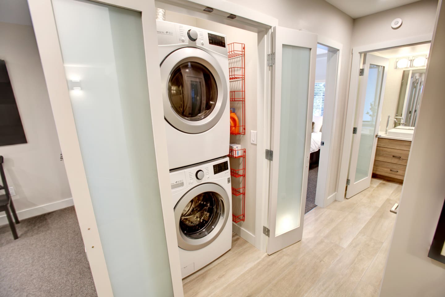 Laundry Closet on 2nd floor includes Full-Size Washer & Dryer +   Ironing board & steam iron.  
A starter supply of laundry detergent and fabric softener included with each stay. 