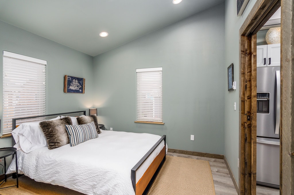 Back bedroom with premium green tea memory foam Queen size bed.