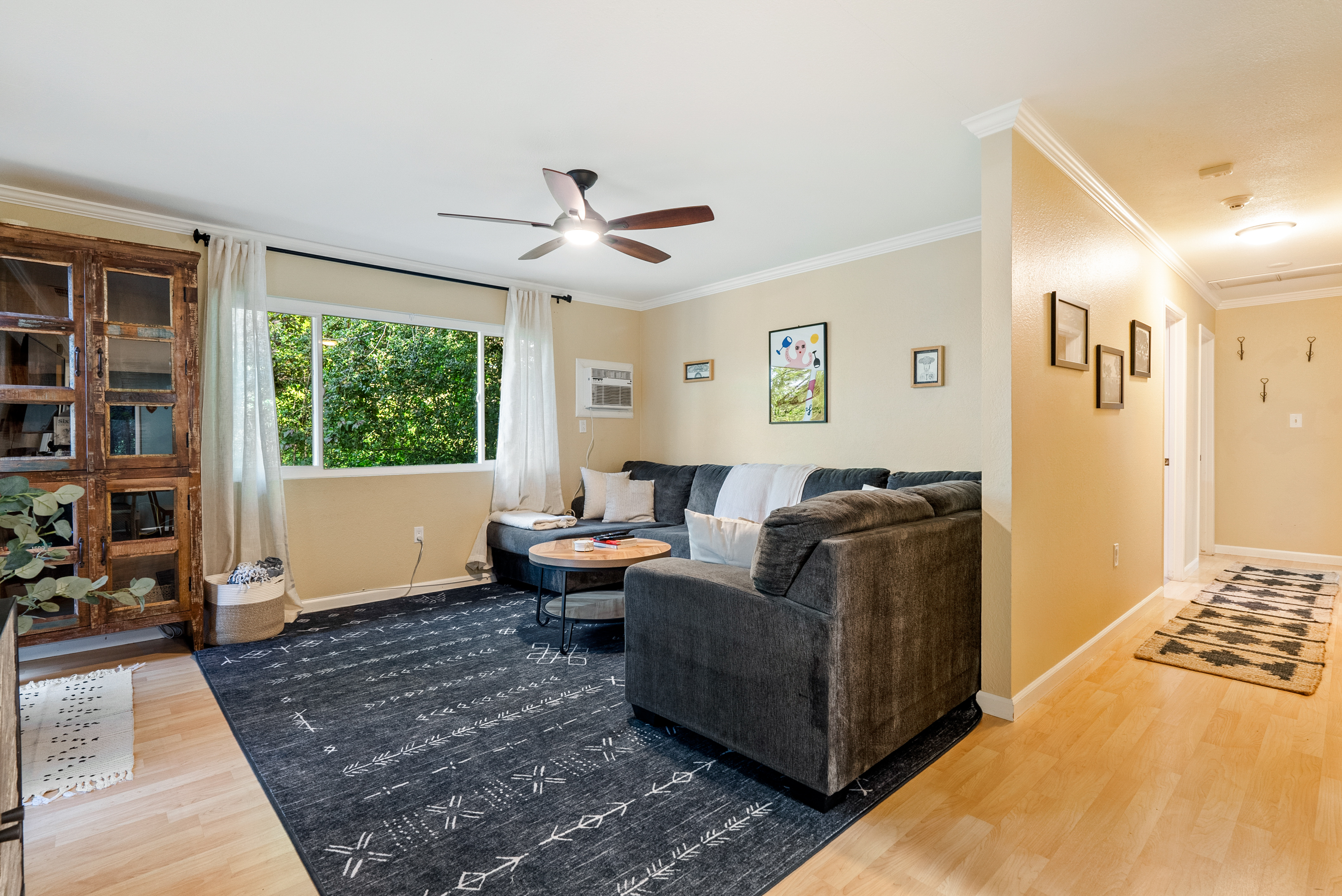 Experience total comfort for movie nights and group gatherings in this living area.
