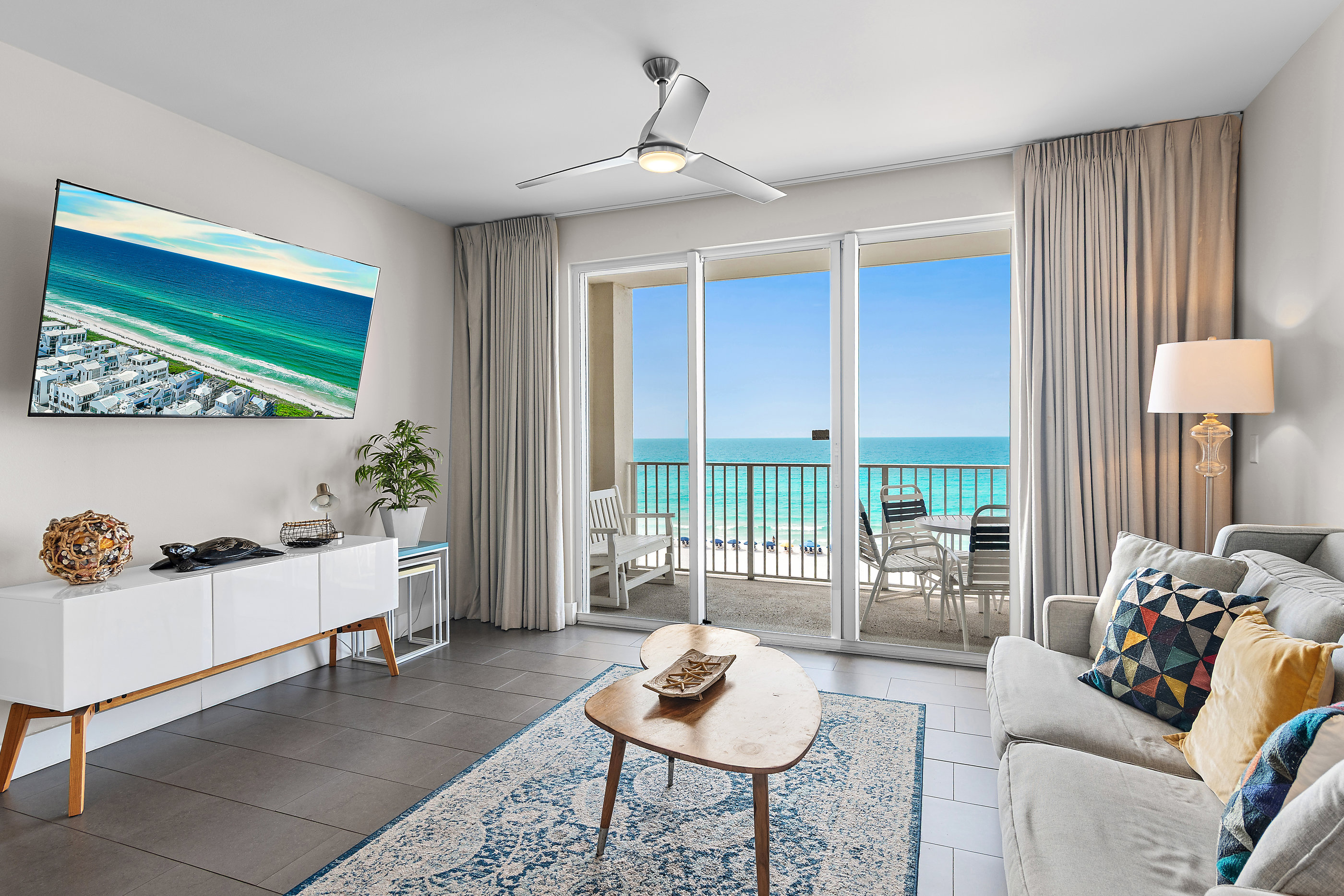 Spacious living area with plenty of seating, sleeper sofa, 65" Smart TV, relax while enjoying those incredible GULF VIEWS!