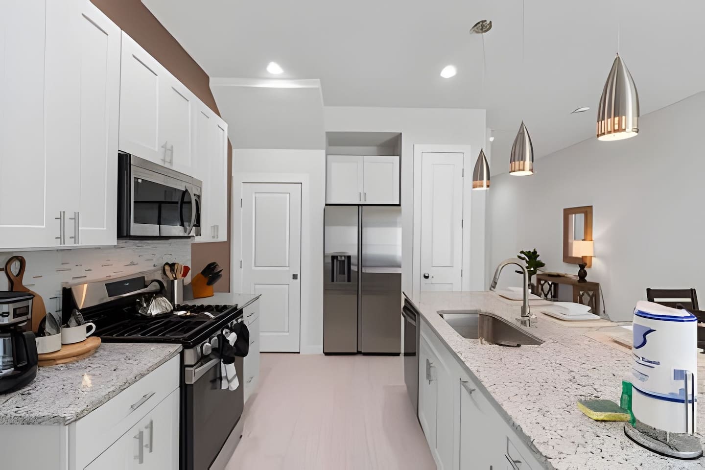 Enjoy both style and functionality in this open kitchen and dining space.