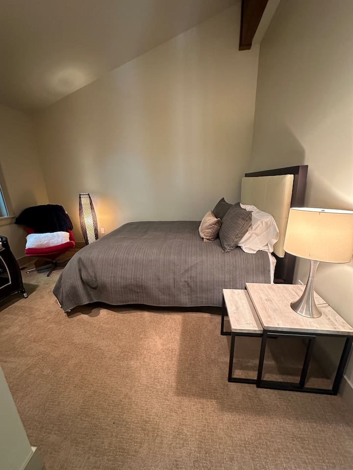 Queen bedroom on the second floor, featuring convenient access to the Jack and Jill bathroom.