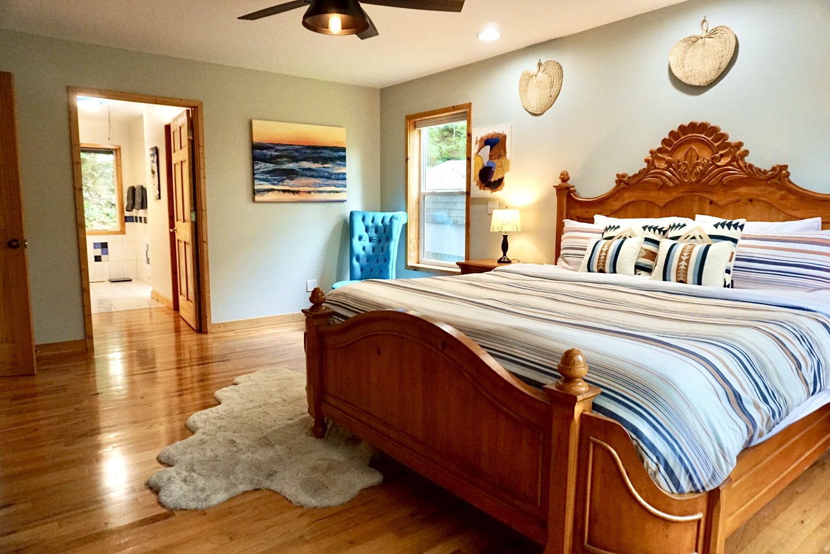Bedroom Retreat: Embrace serene mornings in a spacious haven adorned with rustic charm!