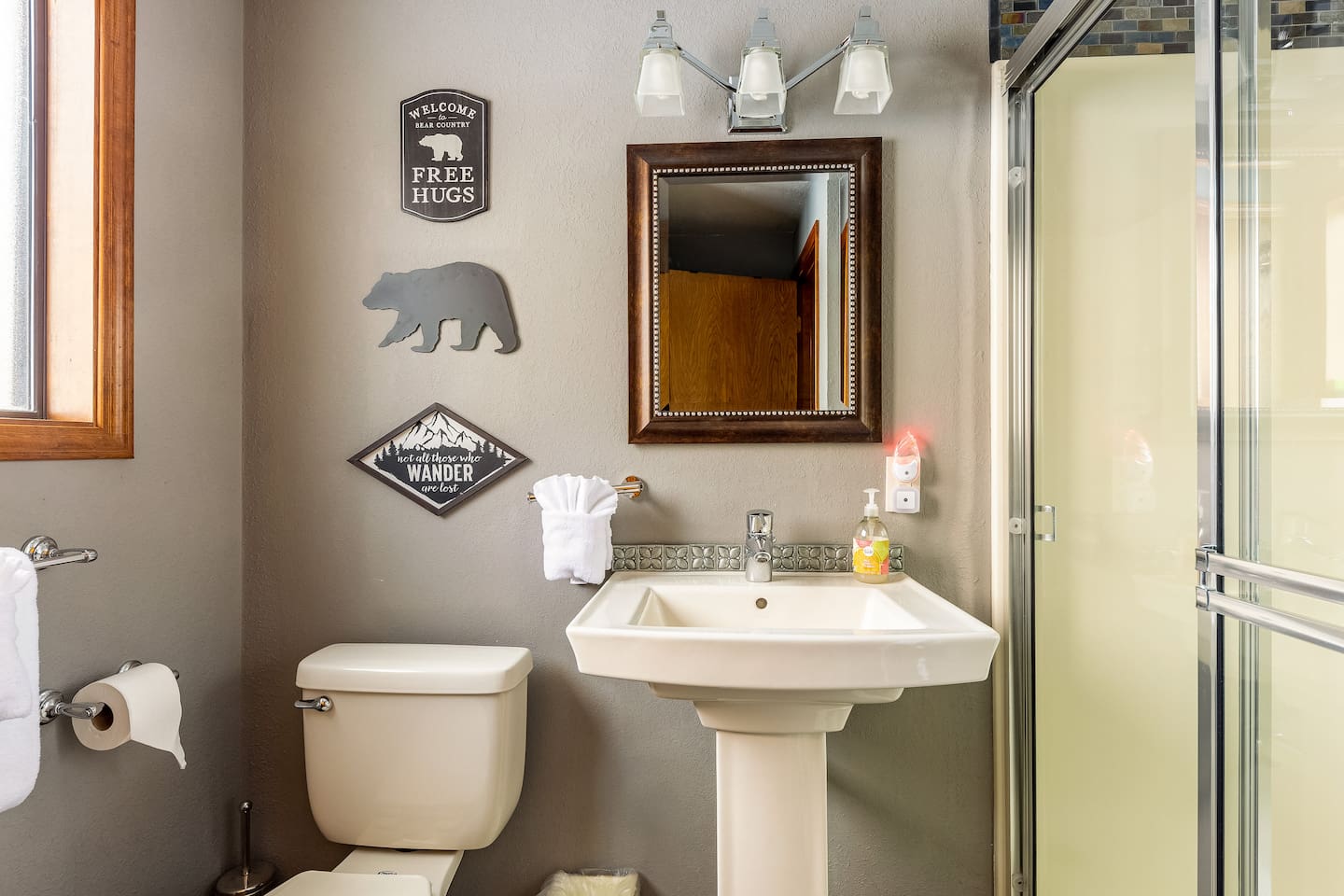 A "Bear Bath," this bathroom (right outside the second bedroom on the main floor) features a shower along with a closet. 